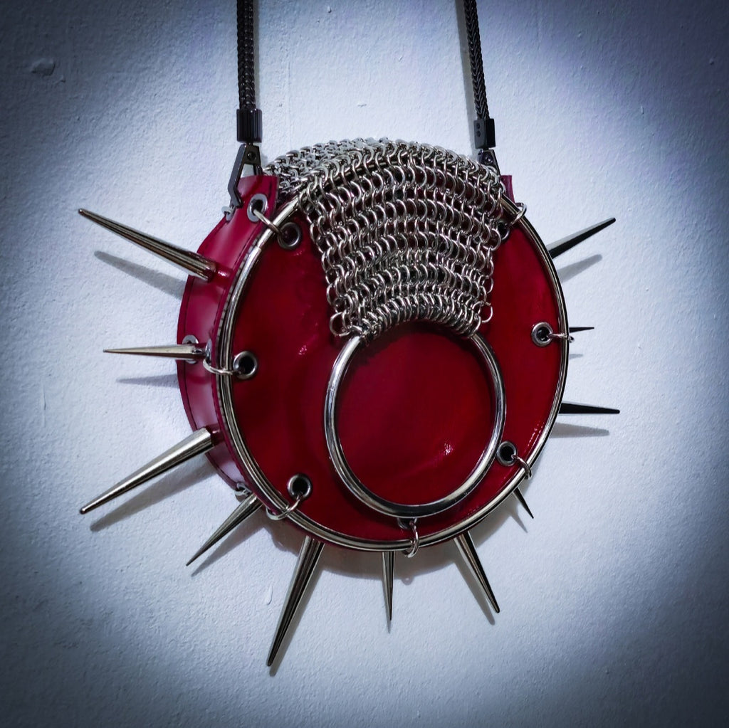 Leather purse with spikes