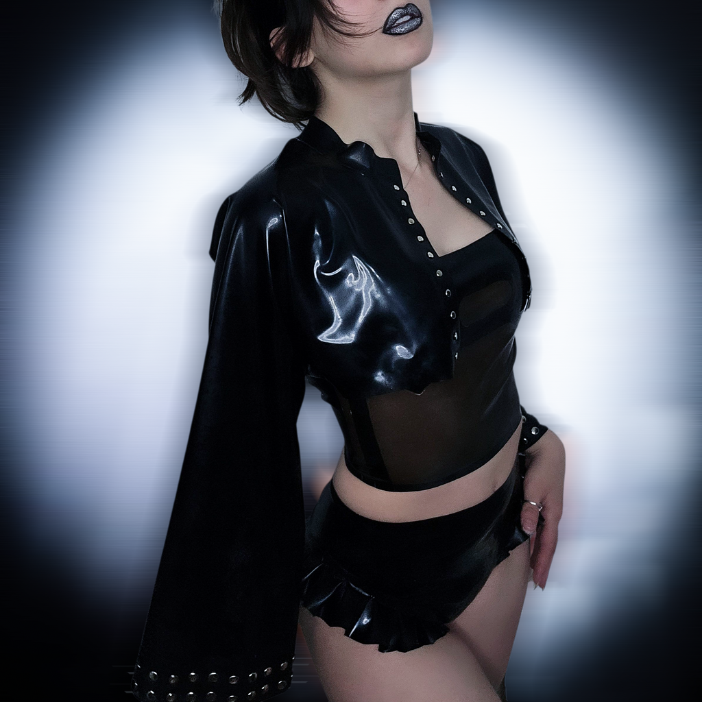 Latex set: latex bolero, latex top, latex shorts