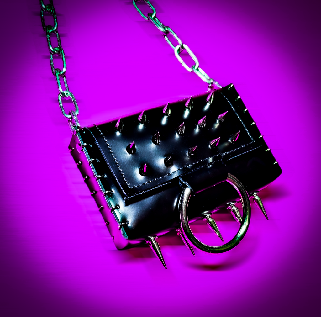 Leather purse with spikes
