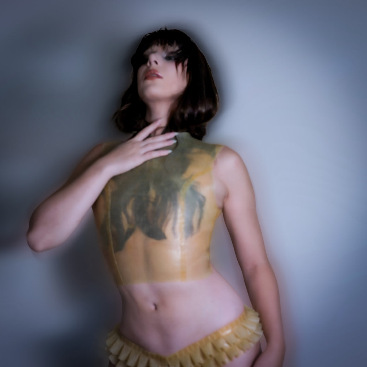 Tranclucent textured latex top