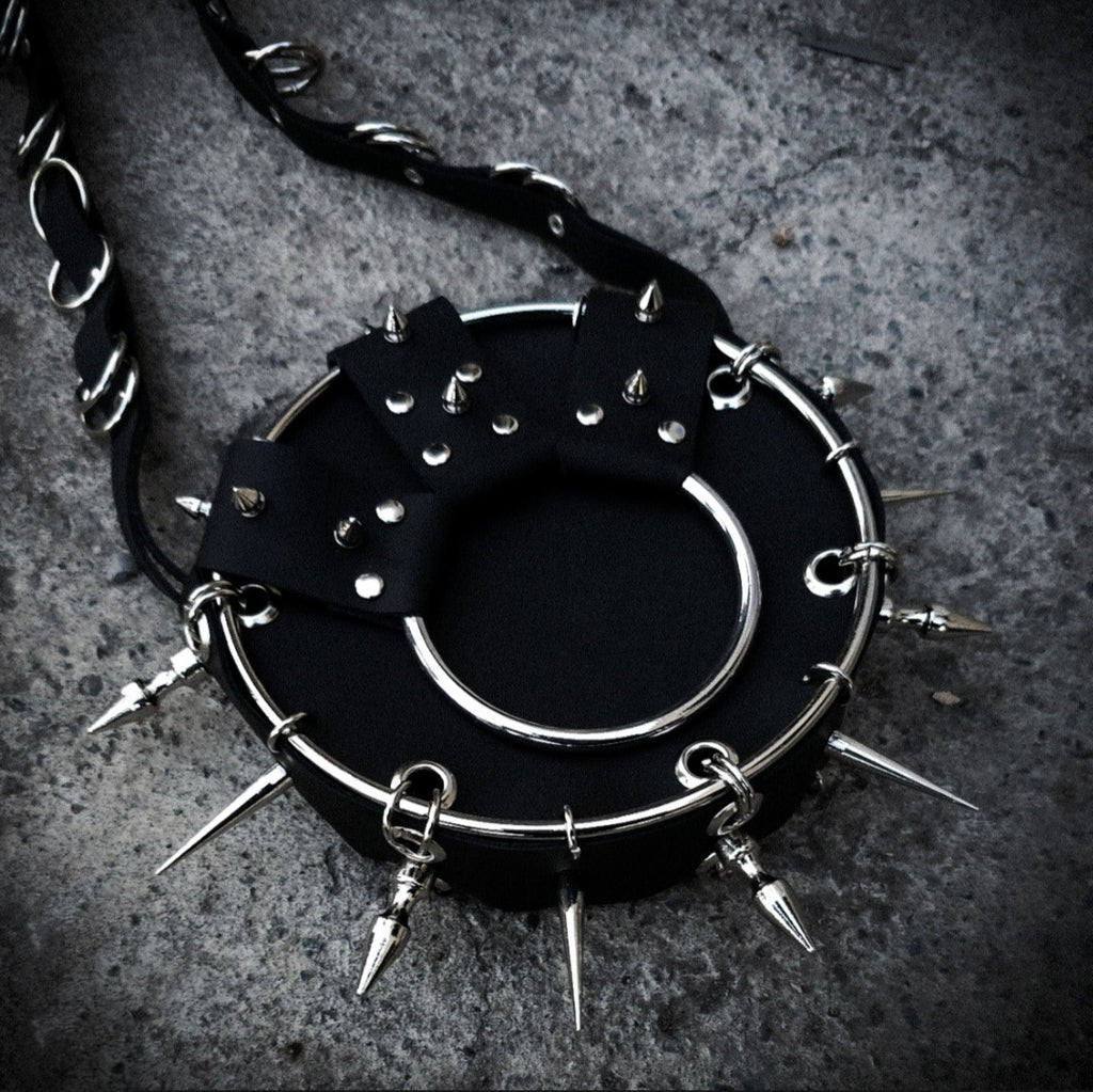Leather purse with spikes