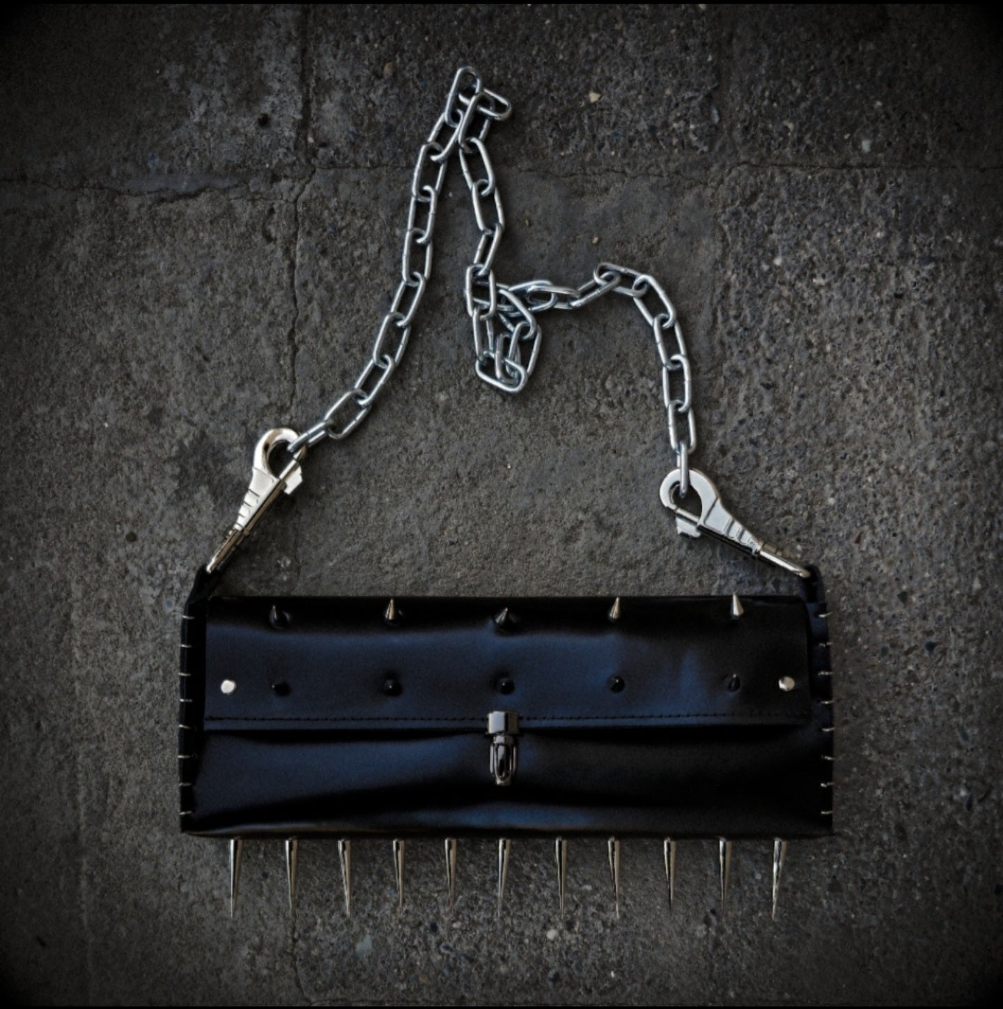Leather purse with spikes