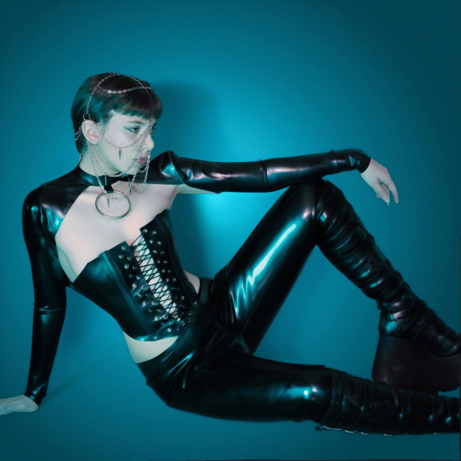 Black latex bolero top with o ring