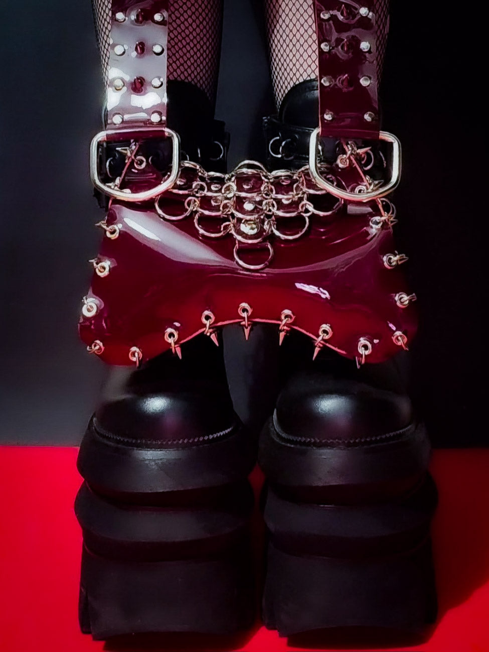 Leather purse with eyelets and rivets