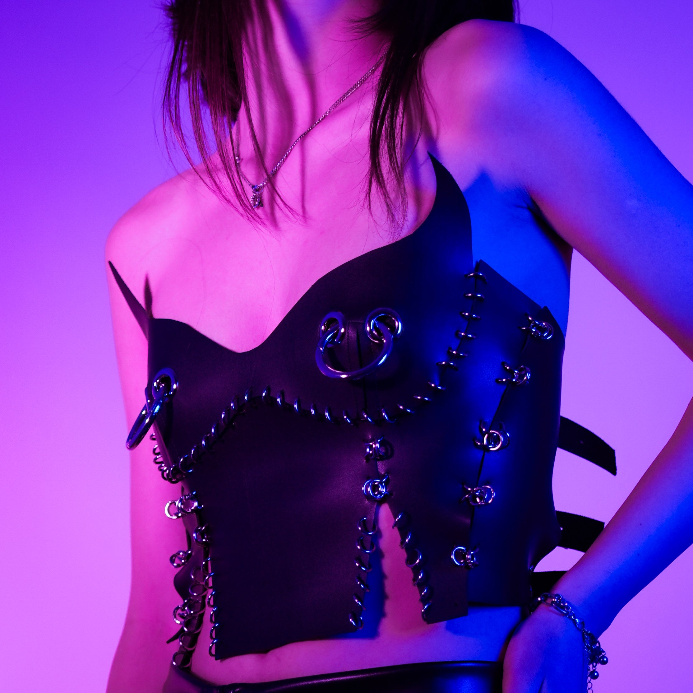 Leather corset top with piercings